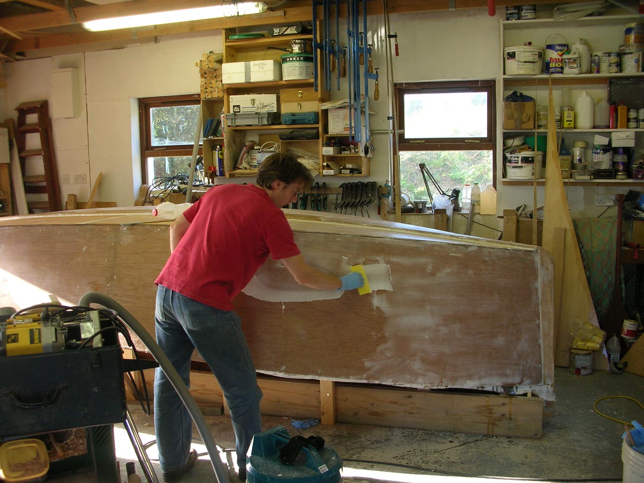 Catbirdfairing Fairing the hull of a Catbird 16 lugsail yawl sharpie by Roeboats, West Cork Ireland, For sale