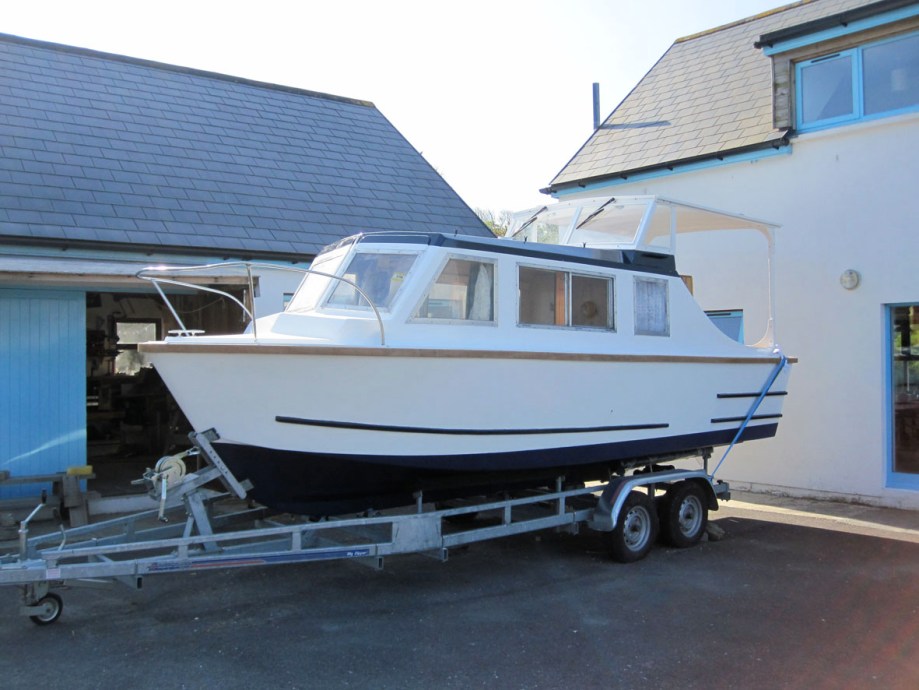 21 foot River cruiser repainted, repaire, faired and with new cockpit cover