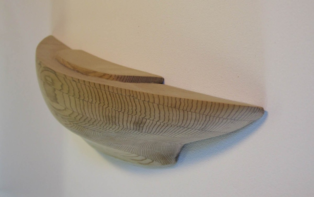 Stern quarter view of Kingstown 18 footer three tonner gaff sail boat